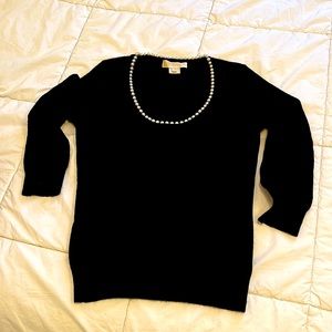 Black sweater pearl neckline